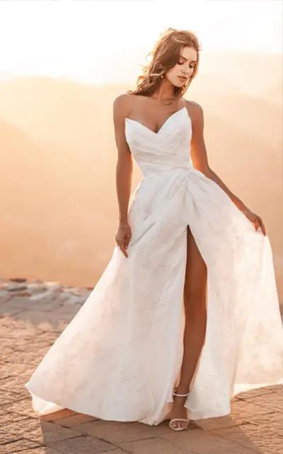 Model wearing a white bridal gown